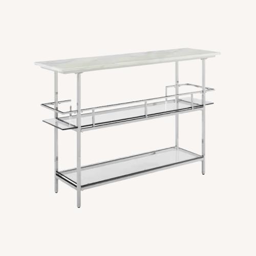 Used Chrome Bar with Paper Faux Marble Top for sale on AptDeco