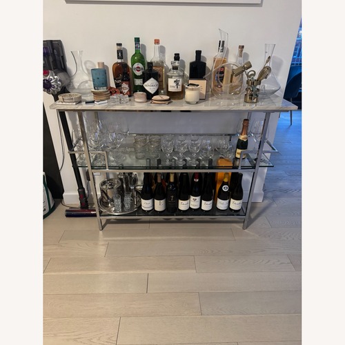 Used Chrome Bar with Paper Faux Marble Top for sale on AptDeco
