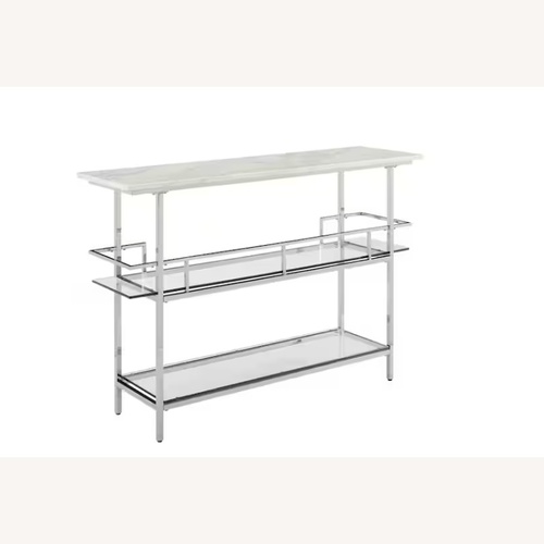 Used Chrome Bar with Paper Faux Marble Top for sale on AptDeco