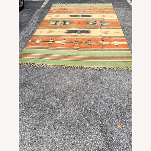 Used Large Multi Color Rug for sale on AptDeco