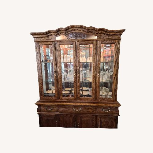Used Oak Wood Interiors Dark Brown Wood Wall Unit for sale on AptDeco