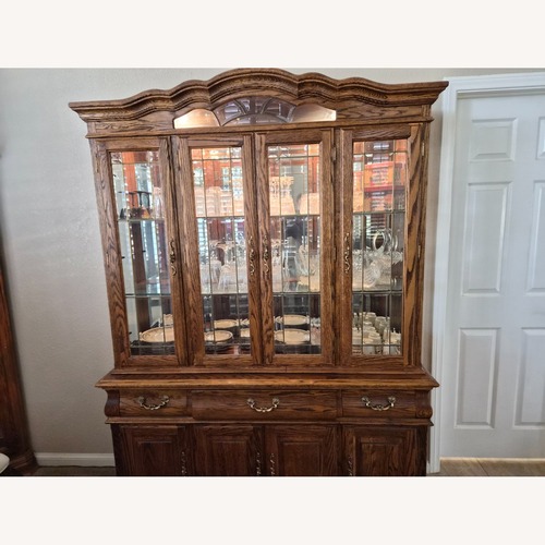 Used Oak Wood Interiors Dark Brown Wood Wall Unit for sale on AptDeco