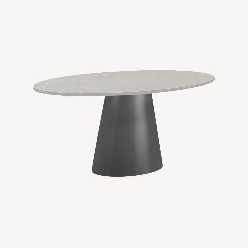 Used Room & Board Decker Oval Dining Table — Quartz Top for sale on AptDeco
