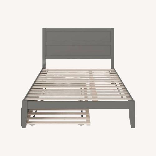Used Dark Gray Wood Queen Bed for sale on AptDeco