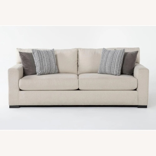 Used Living Spaces Beige Sofa for sale on AptDeco