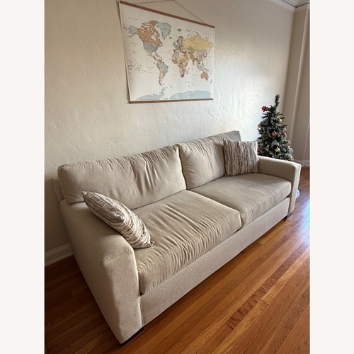 Used Living Spaces Beige Sofa for sale on AptDeco