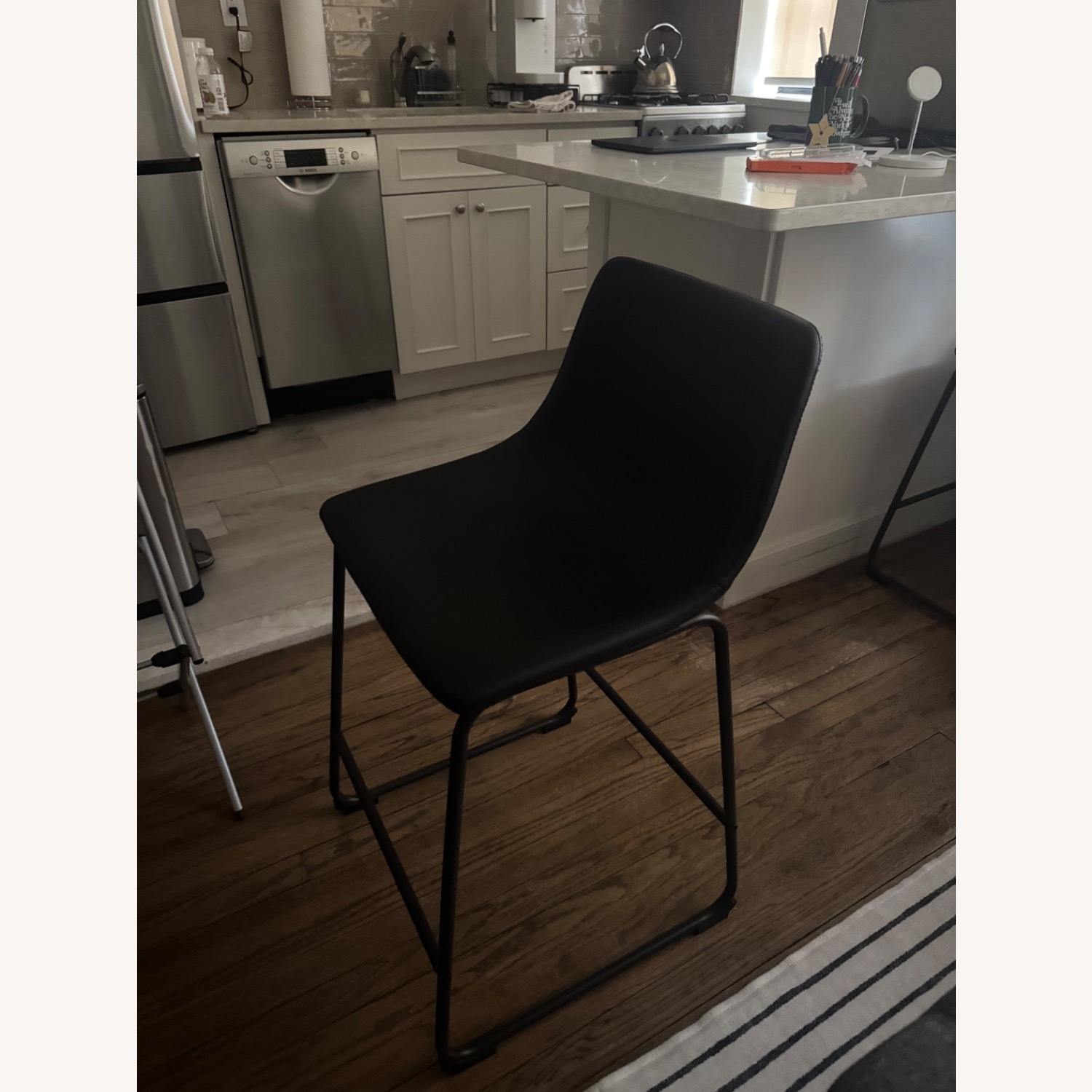 Ashley Furniture Centiar Black Faux Leather Stools - image-1