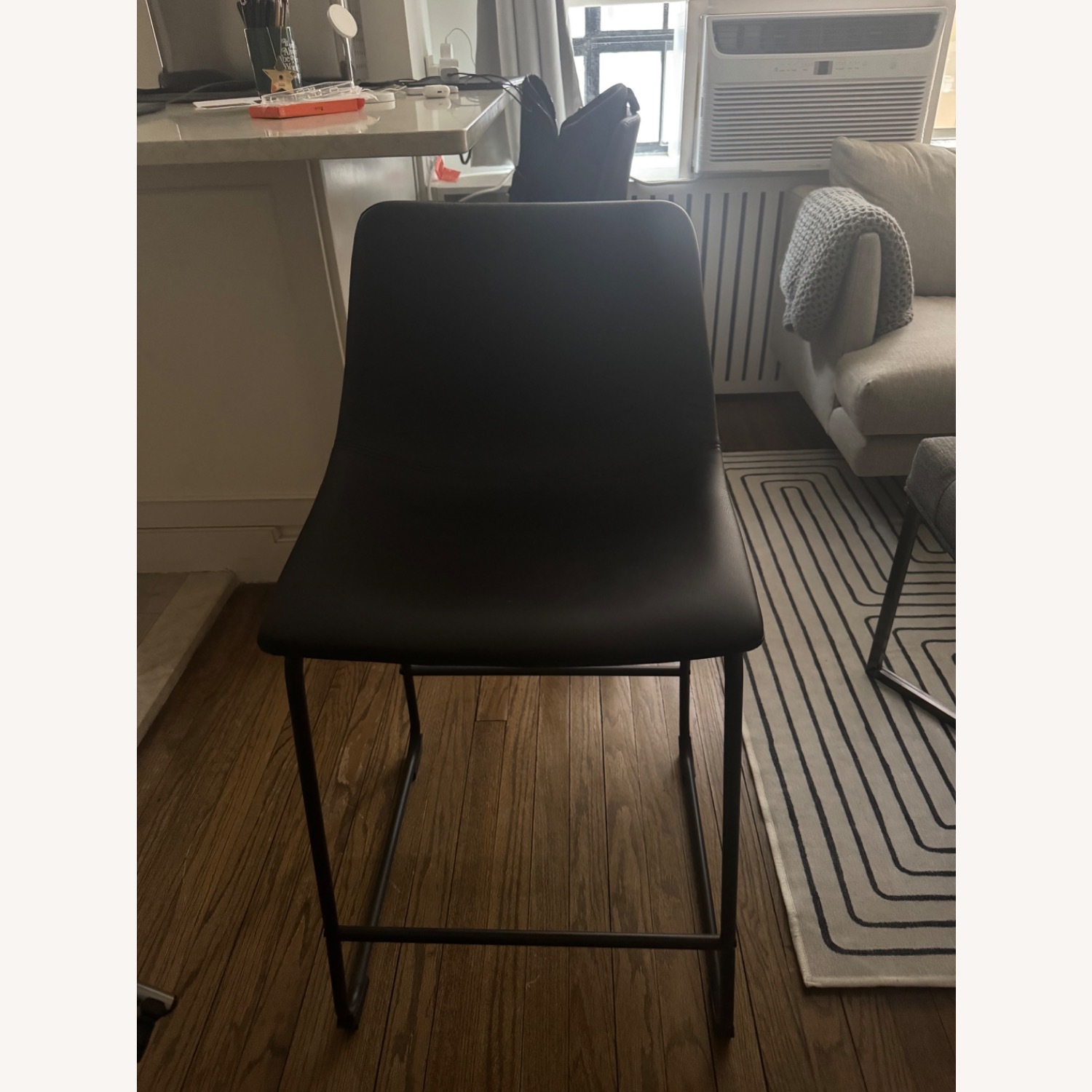 Ashley Furniture Centiar Black Faux Leather Stools - image-2