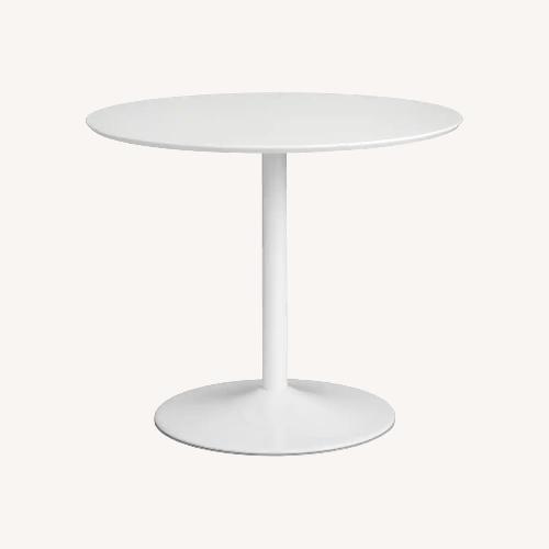 Used Bed Bath & Beyond Carson Carrington Klemens Round Dining Table for sale on AptDeco