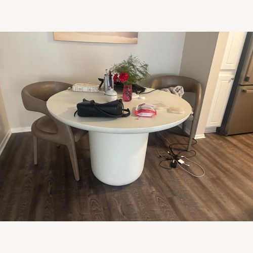 Used CB2 Lola Table White Stone Kitchen Island for sale on AptDeco