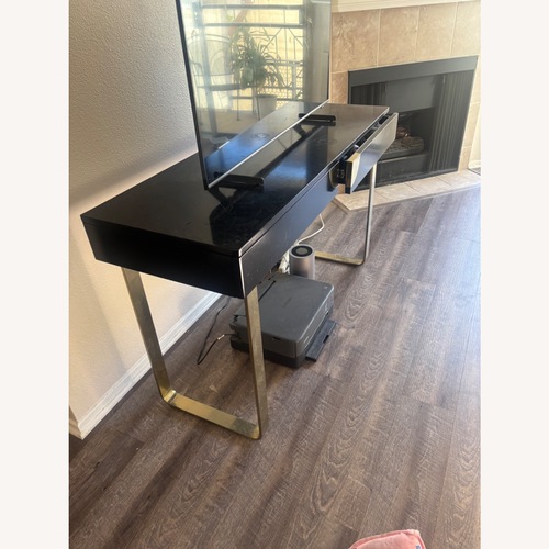 Used Anthropologie Black Lacquered Glinda Console Table for sale on AptDeco
