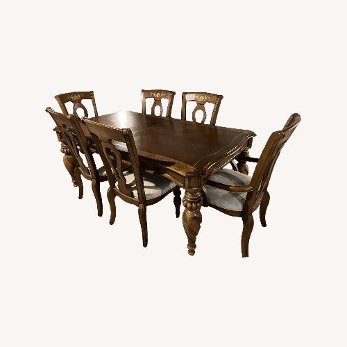 Used Dining Table With Six Chairs and a Leaf for sale on AptDeco
