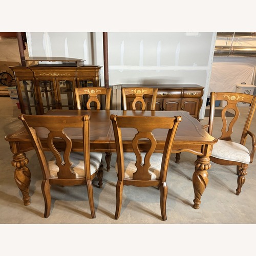 Used Dining Table With Six Chairs and a Leaf for sale on AptDeco