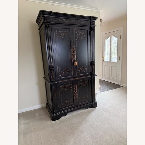 Used Large Wooden Armoire for sale on AptDeco