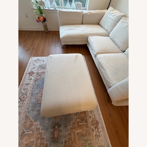 Used IKEA Nockeby White Fabric Footstool for sale on AptDeco