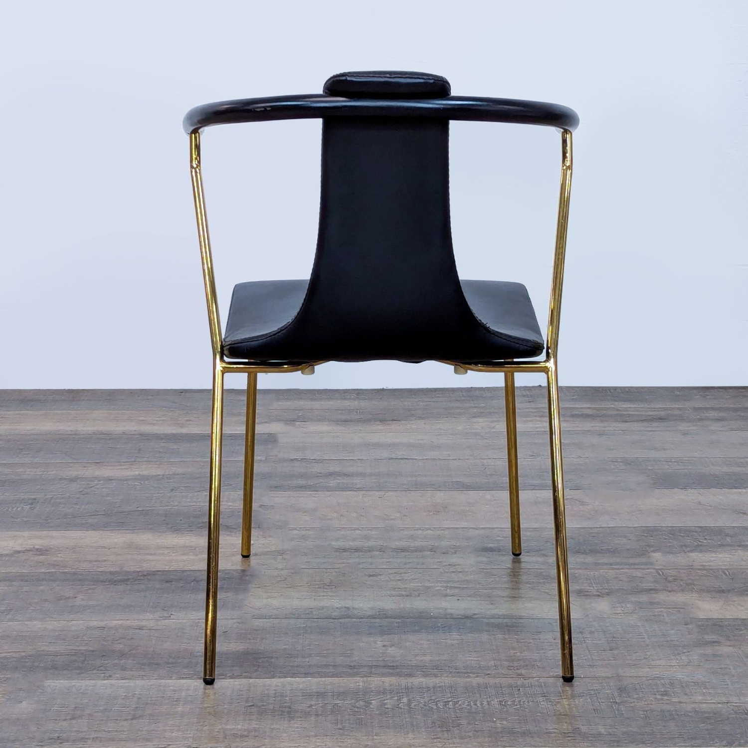 Sleek Black Modern Armchair with Gold Metal Frame - image-4