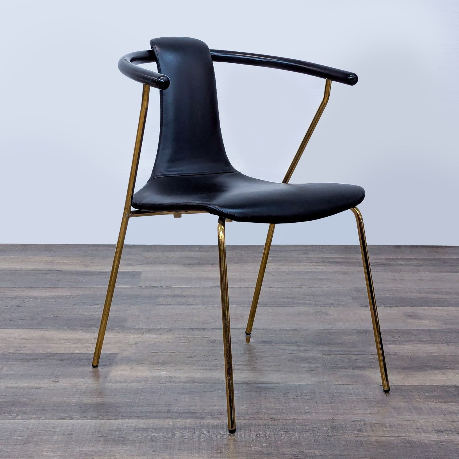 Sleek Black Modern Armchair with Gold Metal Frame - image-2