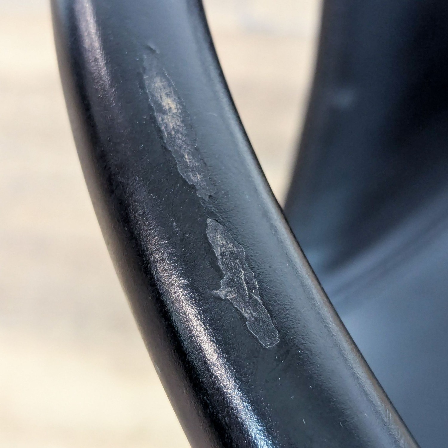 Sleek Black Modern Armchair with Gold Metal Frame - image-7