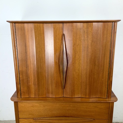 Used Vintage Mid-Century Modern Walnut Tall Dresser for sale on AptDeco