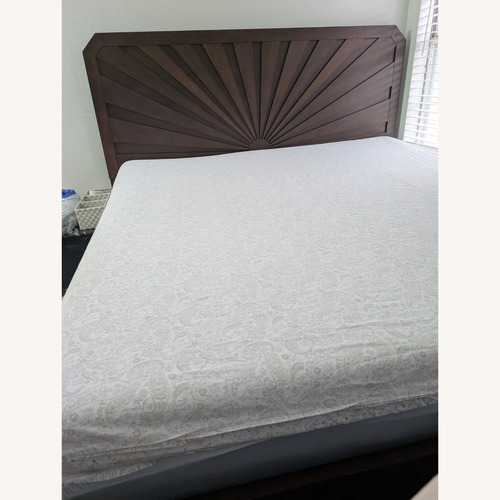 Used Ashley Furniture Dark Brown Wood King Bed for sale on AptDeco