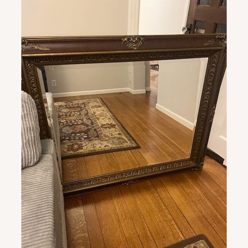 Used Carved and Beveled Wood Framed Wall Mirror for sale on AptDeco