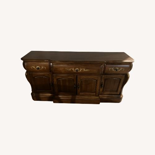 Used Kathy Ireland Home Light Brown Wood Armoire for sale on AptDeco