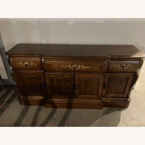 Used Kathy Ireland Home Light Brown Wood Armoire for sale on AptDeco