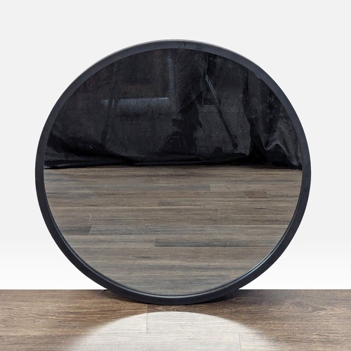 Used Umbra Hub Decorative Wall Mirror for sale on AptDeco