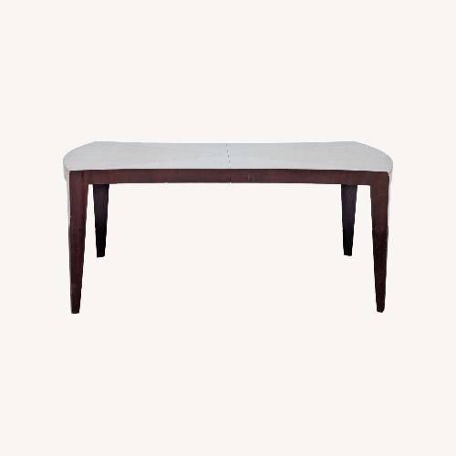 Used Wood Dining Table with Two Leaves for sale on AptDeco