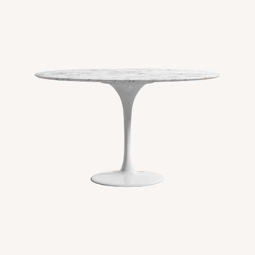 Used Saarinen & Eames White Marble Dining Table for sale on AptDeco
