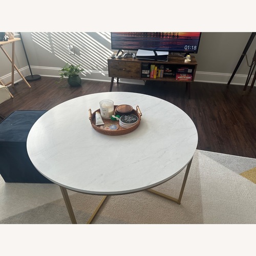 Used Wayfair Coffee Table With Gold X-Base for sale on AptDeco