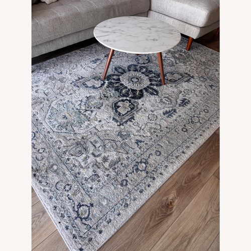 Used Article Blue Area Rug 5' x 8' for sale on AptDeco
