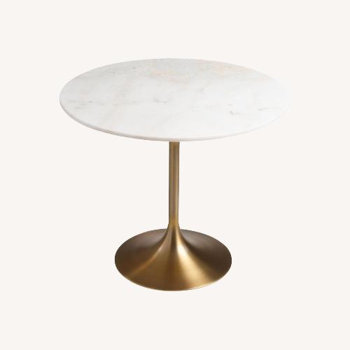 Used World Market Marble Bistro Table Tulip Style for sale on AptDeco