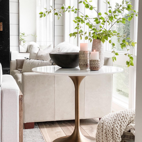 Used World Market Marble Bistro Table Tulip Style for sale on AptDeco