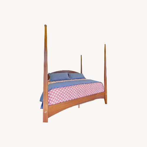 Used Ethan Allen Light Brown Wood Queen Bed for sale on AptDeco