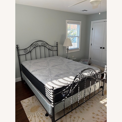Used Classic Gray Metal Queen Bed Frame for sale on AptDeco