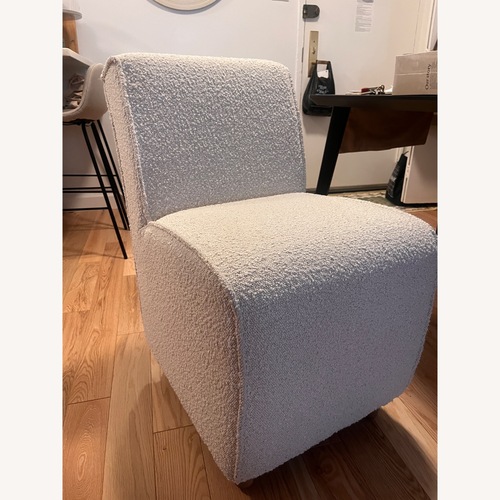 Used Anthropologie White Boucle Dining Chairs for sale on AptDeco