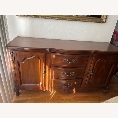 Used Vintage/Antique Dark Brown Wood Dresser for sale on AptDeco