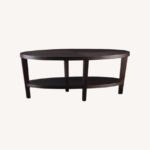 Used Dark Brown Wood Coffee Table for sale on AptDeco