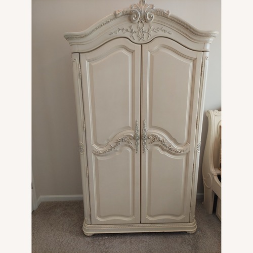 Used Jessica Mcclintock Lea White Wood Armoire for sale on AptDeco