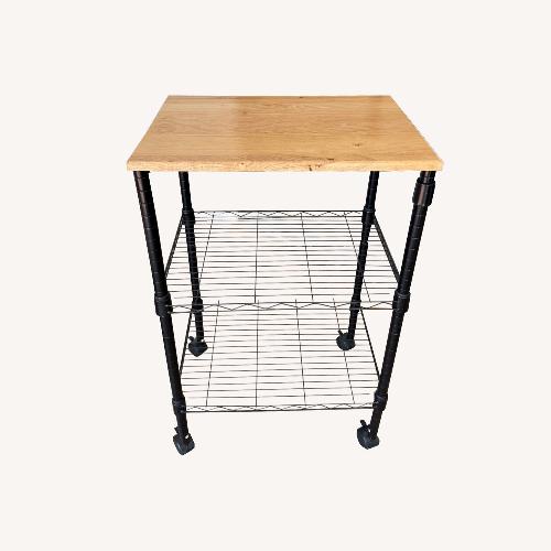 Used Natural Metal Side Table for sale on AptDeco