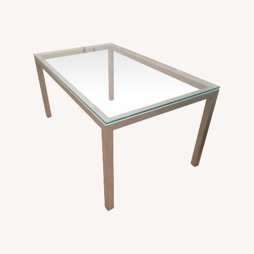 Used Gray Glass Dining Table Clear Glass Gray Base for sale on AptDeco