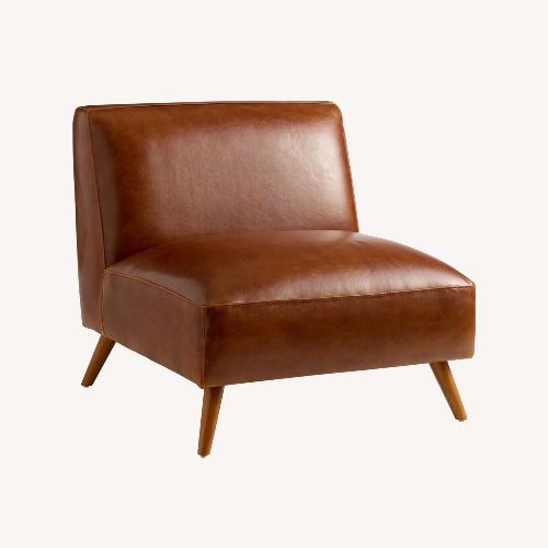 Used World Market Light Brown Leather Accent Chair for sale on AptDeco