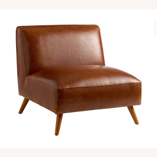 Used World Market Light Brown Leather Accent Chair for sale on AptDeco