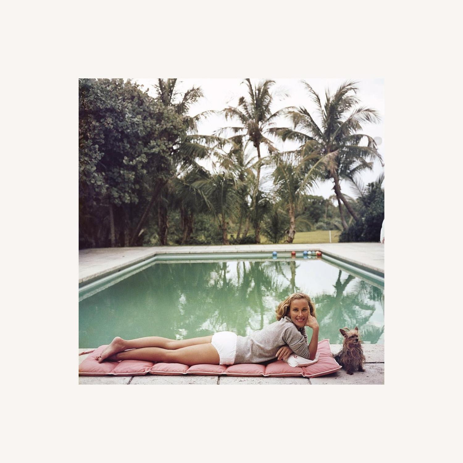 Slim Aarons Having A Topping Time Wall Art - image-0