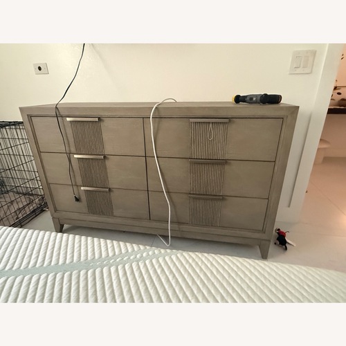 Used Rooms To Go  Natural Wood Dresser for sale on AptDeco