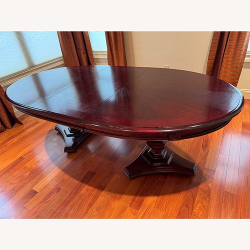Used Stanley Furniture Dark Brown Wood Dining Table for sale on AptDeco