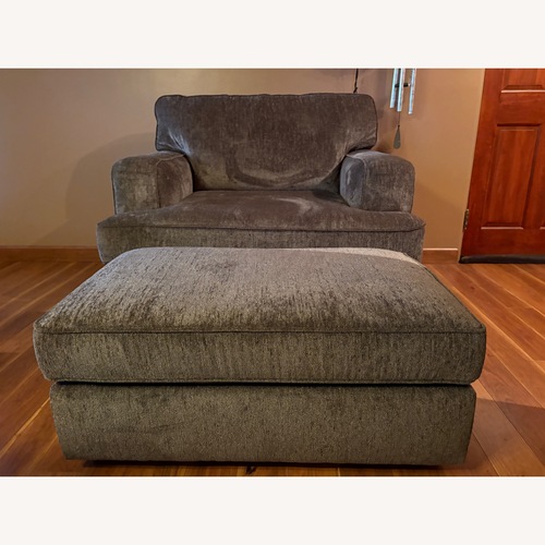 Used Ashley Wilson Brown Chair with Ottoman for sale on AptDeco