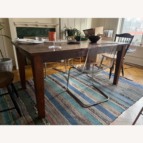 Used ABC Carpet and Home Dark Brown Wood Dining Table for sale on AptDeco