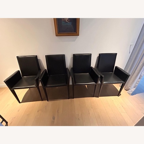 Used Bottega Black Leather Armchairs x4 DWR for sale on AptDeco